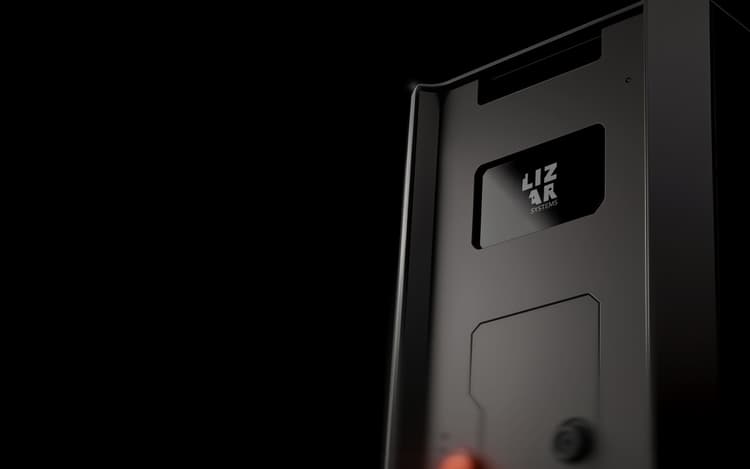 Close-up studio render of a LIZAR personalization unit, its LIZAR Systems badge lit against a black background